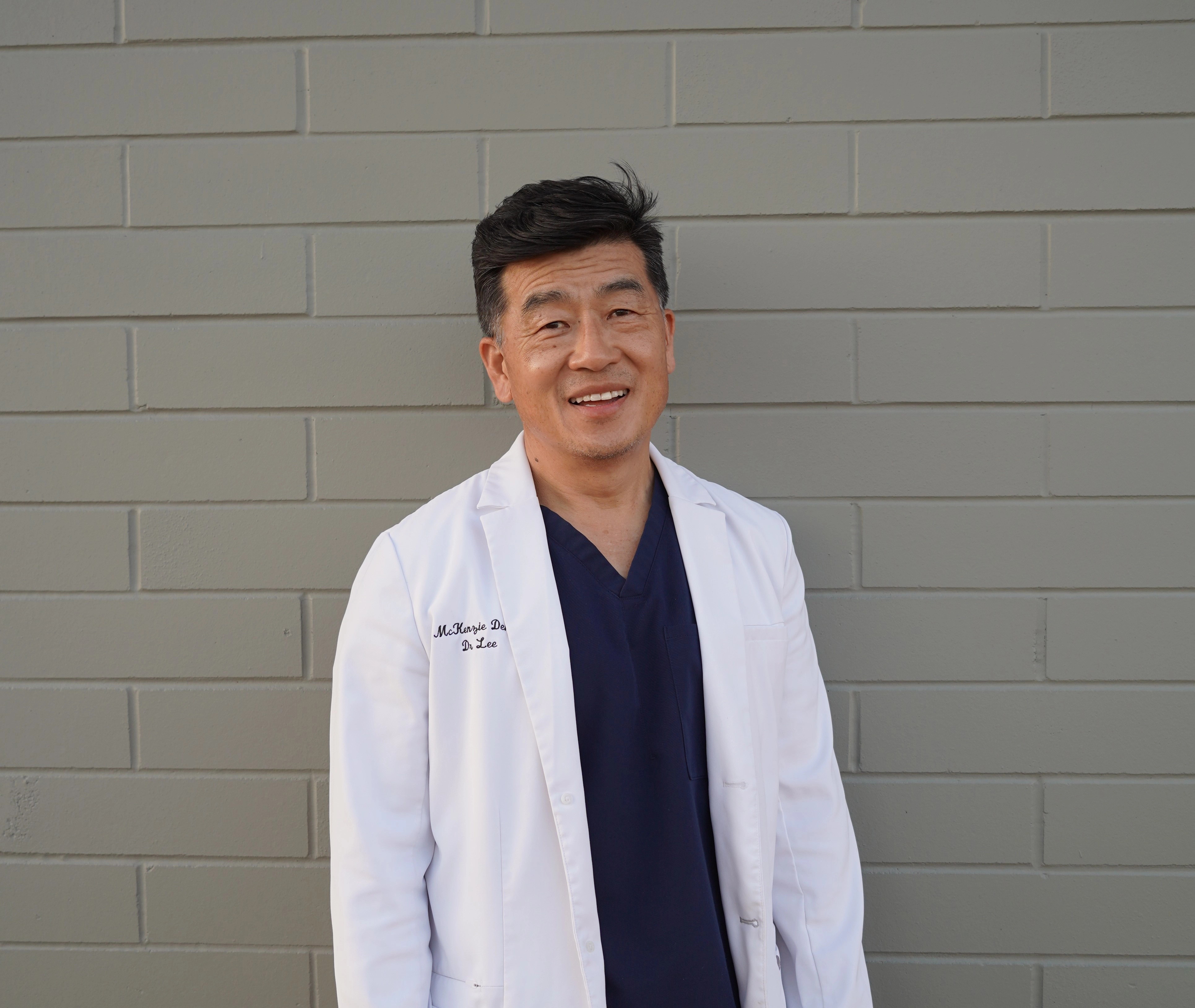Photo of Dr. Lee, the founder and dentist of McKenzie Dental Practices of Oregon, LLC